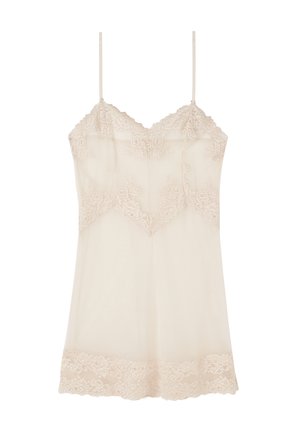 Lace-bim i ljusbeige, med tunna justerbara axelband, v-formad halsringning och genomskinligt tyg med blommig spetsdetalj.
