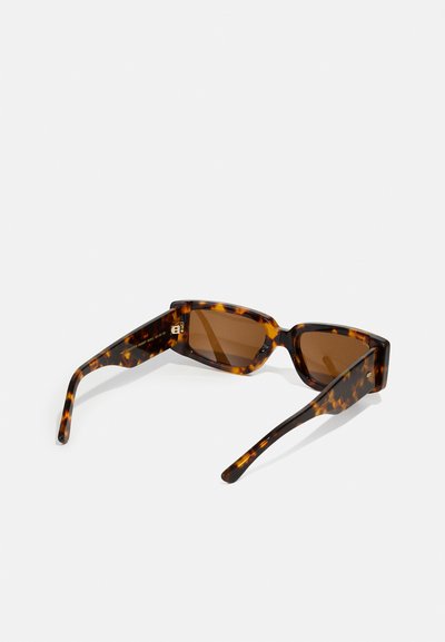 Tortoiseshell sunglasses with brown lenses, rectangular shape, thick arms, and a subtle pattern featuring light and dark brown accents.