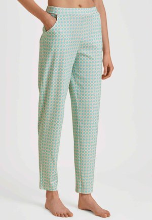 Pantaloni leggeri turchesi con un motivo geometrico ripetuto in corallo e bianco. Presentano tasche laterali e un design aderente.