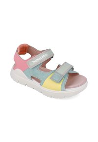 Sandalia multicolor con parte superior de ante en verde menta, rosa y amarillo, correas ajustables de Velcro y suela de goma blanca.