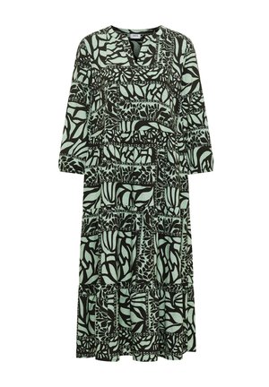 Robe midi à coupe ample, manches trois-quarts, encolure en V, avec motifs abstraits de feuilles noires et chaînes sur tissu vert clair.