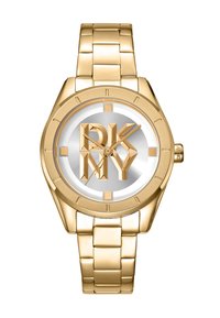 Orologio color oro con bracciale in acciaio inox, caratterizzato da un quadrante argento e un logo in rilievo dorato "DKNY" al centro. Include le tacche per le ore.