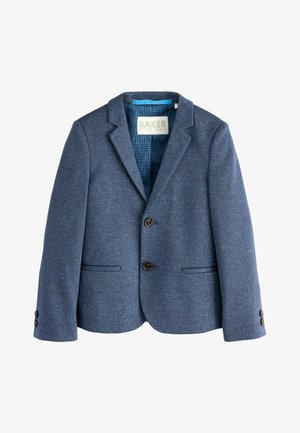 Sötétkék tengerészkék blézer texturált anyagból, megmunkált gallérral, két első zsebbel és barna gombos záródással. Minták láthatók a bélésen belül.