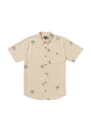 Short-sleeve button-up shirt in beige fabric, featuring green and purple circular patterns. Includes a left chest pocket and brown buttons.