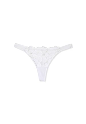 Weiße Spitzenstringtanga mit floralem Muster, transparentem Material und elastischen Bändern. Die Vorderseite ist mit filigraner Stickerei verziert, die ein zartes Design schafft.
