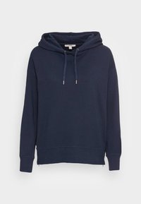 Mörkblå hoodie i mjukt tyg, med en dragskohed, ribbade ärmslut och sidoflikar i nederkant för extra komfort.