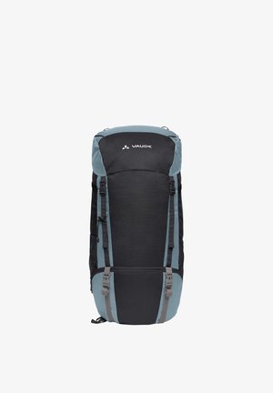 Sac à dos de randonnée noir et bleu avec plusieurs sangles, boucles, poches latérales en filet et logo Vaude au centre en haut.