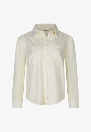 Chemise en velours côtelé de couleur crème à manches longues, avec une fermeture à boutons sur le devant, deux poches poitrine et un col classique.