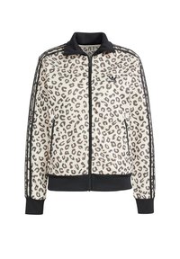 Leopardmönstrad zip-up jacka med svart krage och manschetter. Har tre svarta ränder ned längs varje ärm och två framfickor.