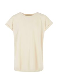 Krämfärgad kortärmad t-shirt med rund halsringning, avslappnad passform, mjuk textur och uppvikta ärmar.