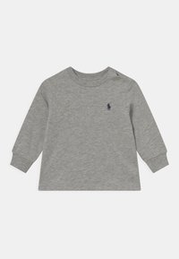 Gray long-sleeve shirt made of soft cotton. Features a crew neckline, ribbed cuffs, and a small navy logo on the chest.