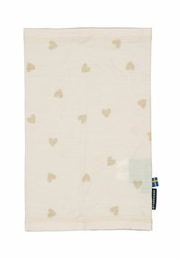 Cotton tæppe i cremefarve med et mønster af små beige hjerter. Afslutningen inkluderer en syet kant og et mærke med det svenske flag.