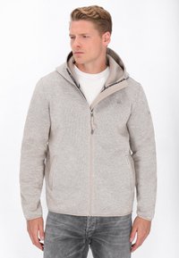 Svijetlosiva dukserica s kapuljačom, od teksturirane pletenine, s patentnim zatvaračem, dva bočna džepa i kontrastnom unutarnjom podlogom. Slim fit dizajn.