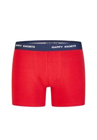 Czerwone bawełniane bokserki z granatową gumką w pasie oznaczoną napisem "HAPPY SHORTS". Charakteryzują się dopasowaniem i płaskimi szwami dla komfortu.