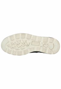 Suela de zapatilla negra con una suela de goma blanca texturizada que presenta un patrón de rectángulos y agarres triangulares para tracción.