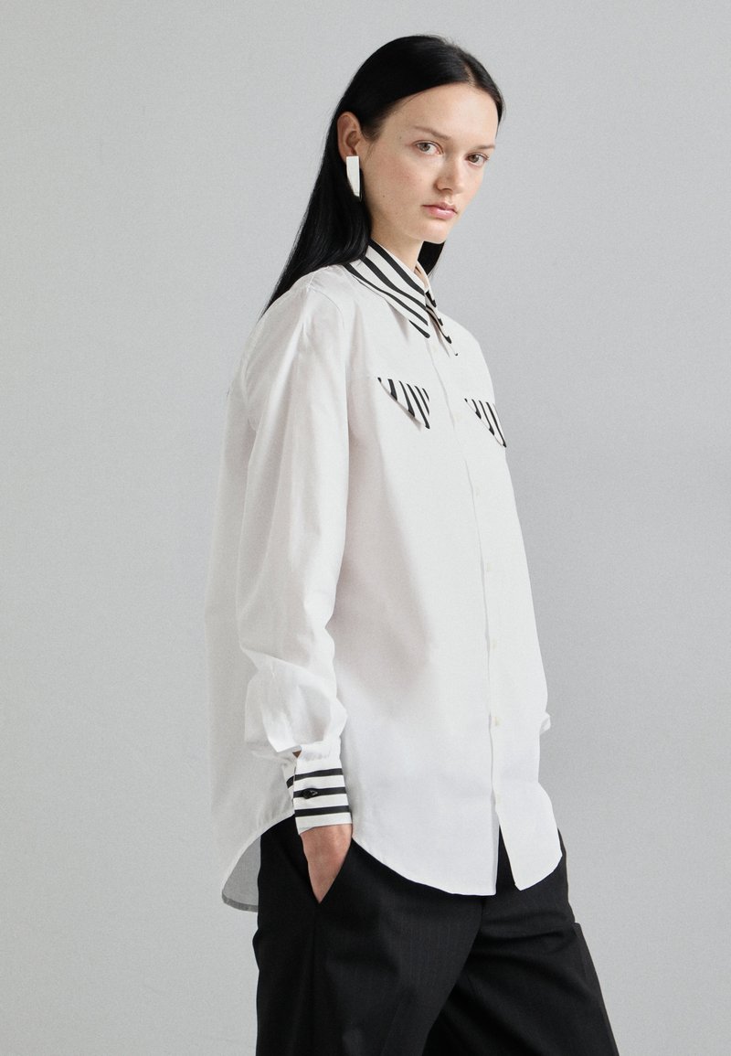 Ivory Asymmetrical Stripe Button Down Blouse main image 0