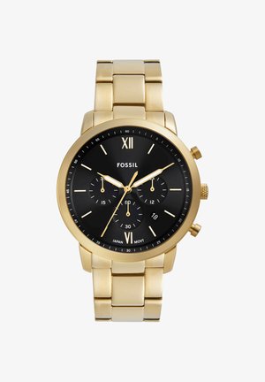 Montre-bracelet Fossil en métal doré avec cadran chronographe noir, chiffres romains à 12 et 6 heures, trois sous-cadrans et une fenêtre date à 4 heures.