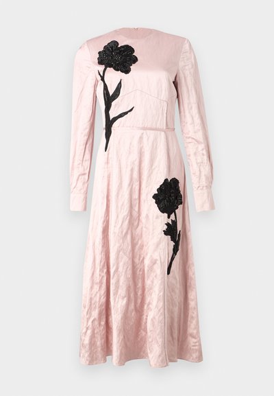 Pink dress with a textured finish, featuring black floral embroidery on the bodice and skirt, long sleeves, and a round neckline.