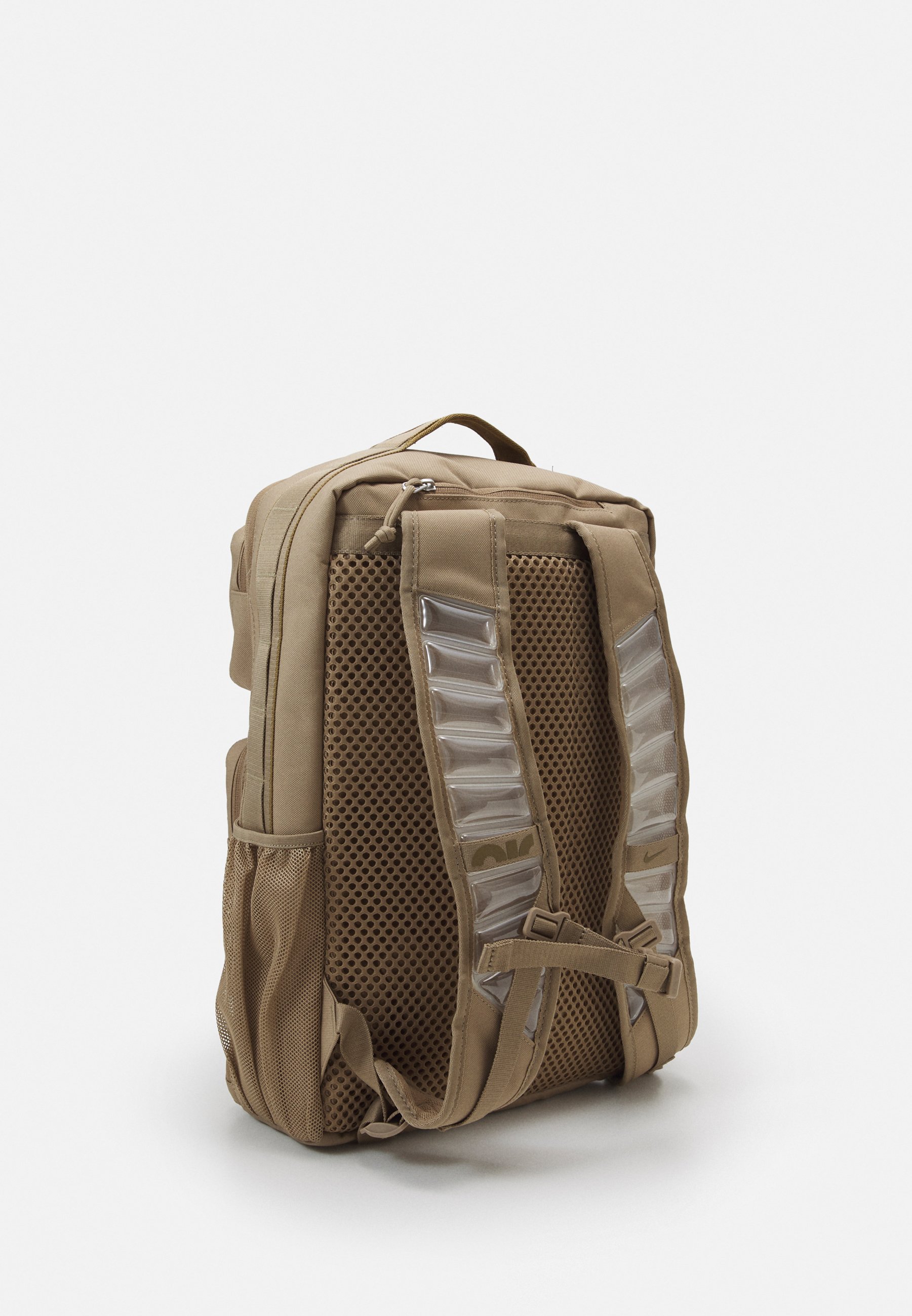 beige nike backpack