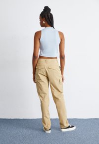 The North Face PANT - Cargobyxor - khaki stone