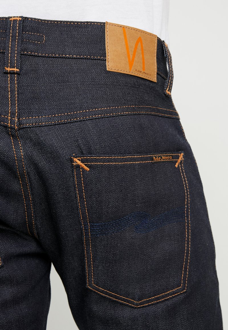 Nudie Jeans Grim Tim Slim Fit Jeans Dry Deep Selvage Zalando Co Uk