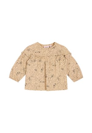 Beige Bluse mit langen Puffärmeln, die mit schwarz gefleckten Mustern und Rüschen entlang des Vorderteils verziert ist. Rundhalsausschnitt, leichtes Material.
