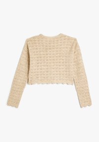 Pull en crochet beige à manches longues, présentant un ourlet en dentelle et des motifs géométriques complexes sur toute la texture du tissu.