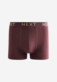 Burgundy boxer alsónadrág puha anyagból, arany "NEXT" logóval a derékrészen, varrás nélküli kialakítással és egyenes szegéllyel.