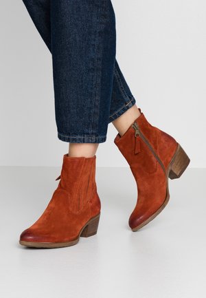 Bottines de cowboy / motard - metallic red