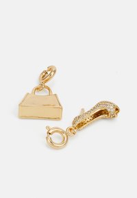 Gold-tone charm earrings featuring a high heel shoe design with rhinestones and a rectangular bag charm, both with shiny finishes.