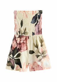 Combinaison fleurie avec un corsage smocké, une coupe courte et un fond crème orné de motifs floraux roses et verts. Tissu texturé.