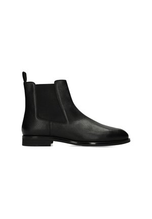 Bottine Chelsea en cuir noir avec panneaux latéraux élastiques, languette au talon et petit talon empilé.