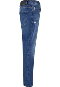 Džinsai slim fit vidutinio mėlynumo, su ištrintomis vietomis, penkiomis kišenėmis ir mygtukų sistema. Lygus paviršius su minimaliais nudėvėjimo ženklais.