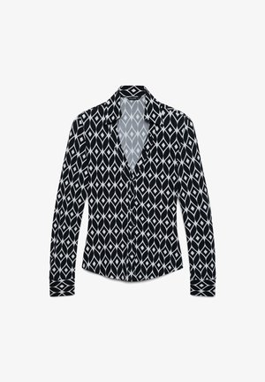 Schwarz-weiße Bluse mit geometrischem Rautenmuster, langen Ärmeln, Reverskragen und Knopfverschluss vorne.