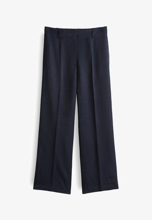 Navy blue wide-leg trousers in a smooth fabric, featuring a flat front, belt loops, and a tailored cut for a structured look.