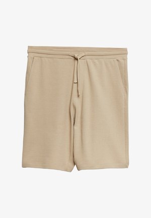 Beżowe teksturowane szorty dzianinowe z elastycznym pasem i sznurkiem, z bocznymi kieszeniami, ułożone na płasko na białym tle.