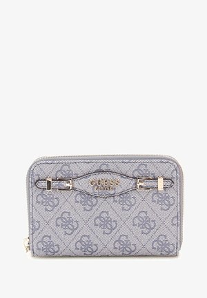 Portefeuille bleu clair avec un tissu à motifs, fermeture zip, quincaillerie dorée et détail de logo embossé sur le devant.