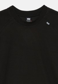 Black textured fabric crewneck shirt with Helly Hansen HH logo tags on collar and near right shoulder.