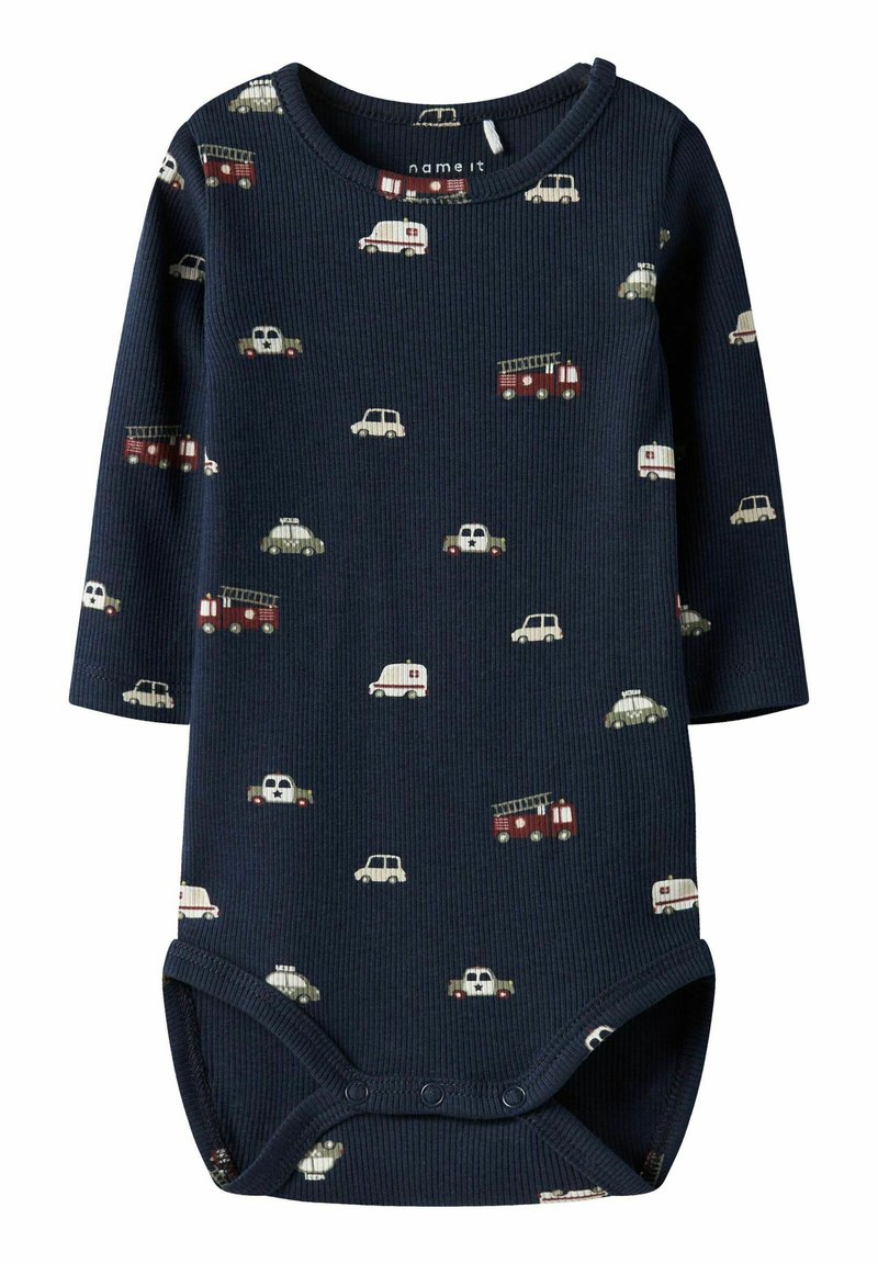 Marineblauw geribd lange mouwen bodysuit met diverse kleine voertuigenpatronen in crème en bordeaux. Heeft een ronde hals en drukknoopsluitingen.