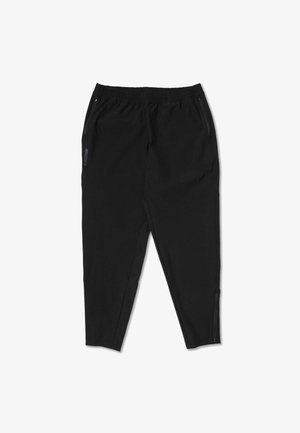 Zwarte sportbroek met een elastische tailleband, twee zijzakken met rits, taps toelopende pijpen en subtiele branding aan de linkerkant.