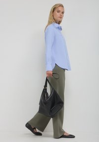 Calliope GINNICO A PALAZZO - Jogginghose - verde