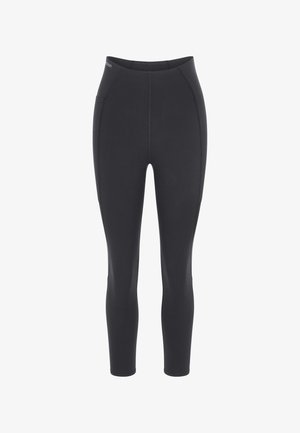 Czarne wysokow talerzeńskie legginsy sportowe z bocznymi kieszeniami i szwami flatlock, zaprojektowane z myślą o wydajności i komforcie.