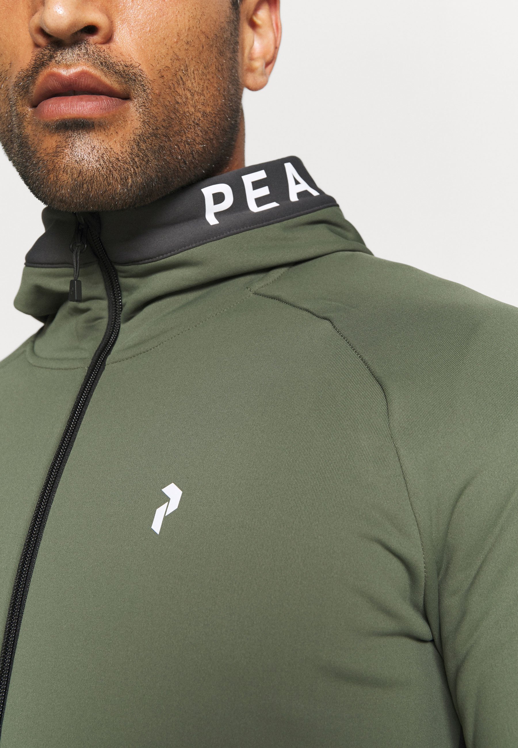 peak performance m rider zip hood