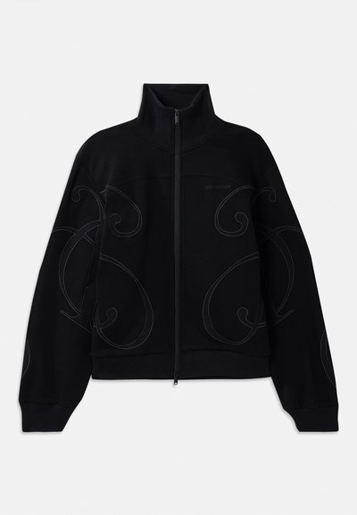 Black zip-up sweatshirt with high collar, featuring subtle tonal swirl patterns and ribbed cuffs. Made from a soft, textured fabric.