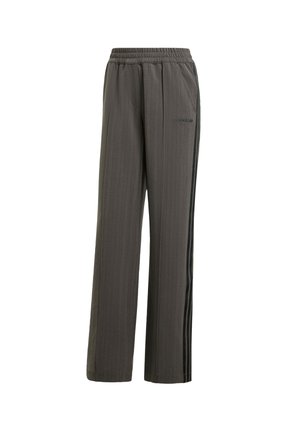 Pantaloni sudore grigi a righe con vita elasticizzata, tasche laterali e strisce nere laterali. Presenta un piccolo logo di marca sul davanti.