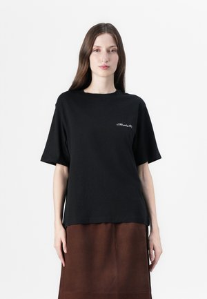 Black cotton t-shirt with a loose fit, short sleeves, and a round neckline. Features subtle white embroidered text on the left chest area.