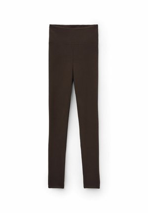 Bruine geribbelde legging met een hoge tailleband, voorzien van een gladde textuur en een aansluitend ontwerp, geschikt voor actieve of casual kleding.