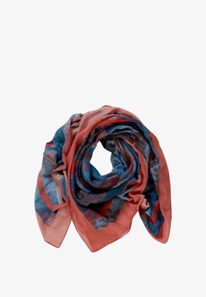 Foulard léger avec motifs cachemire et floraux rouges et bleus, plié de manière lâche pour montrer la texture et les contrastes de couleurs.