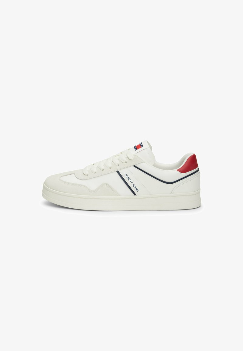 White leather low-top sneakers with red and navy accents, featuring a textured panel and branded side stripe, round toe, and lace-up design.