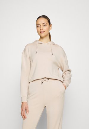 Tuta - beige
